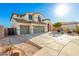 Charming two-story home featuring a 3-car garage and a beautiful landscaped front yard at 19137 W Pasadena Ave, Litchfield Park, AZ 85340