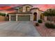 Charming two-story home featuring a 3-car garage and a beautiful landscaped front yard at 19137 W Pasadena Ave, Litchfield Park, AZ 85340