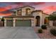 Charming two-story home featuring a 3-car garage and a beautiful landscaped front yard at 19137 W Pasadena Ave, Litchfield Park, AZ 85340