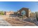 Charming home featuring rock landscaping, a desert garden, and a front yard view from the street at 19675 E Oriole Way, Queen Creek, AZ 85142