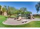 Neighborhood playground with slides and play structures, providing a fun outdoor space for children at 19777 N 76Th St # 1219, Scottsdale, AZ 85255