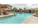 Stunning community pool area with lush landscaping and ample seating for residents to enjoy at 19777 N 76Th St # 1219, Scottsdale, AZ 85255