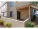 View of the covered patio and access to upper level via the metal stairs at 19820 N 13Th Ave # 169, Phoenix, AZ 85027