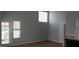 Bright living room featuring light gray walls, wood floors, and neutral accents at 19820 N 13Th N Ave # 282, Phoenix, AZ 85027