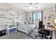 Comfortable bedroom featuring airplane decor, ceiling fan, and ample natural light at 20846 E Longwood Dr, Queen Creek, AZ 85142