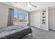 Bedroom with ceiling fan, natural light, closet, and curated wall art at 20846 E Longwood Dr, Queen Creek, AZ 85142