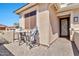 Welcoming entrance with a cozy seating area and charming curb appeal at 20846 E Longwood Dr, Queen Creek, AZ 85142