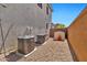 Functional side yard featuring two air conditioning condensers and a storage shed, providing ample utility space at 20846 E Longwood Dr, Queen Creek, AZ 85142