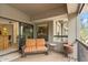 Relaxing outdoor balcony with comfortable seating, offering a peaceful retreat with partial views of the surrounding landscape at 21320 N 56Th St # 2005, Phoenix, AZ 85054