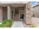 Charming entryway with stone accents leading to the upper-level living spaces at 21320 N 56Th St # 2005, Phoenix, AZ 85054