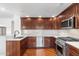 Gourmet kitchen boasting custom cabinetry, stainless steel appliances, and elegant countertops for culinary enthusiasts at 21320 N 56Th St # 2005, Phoenix, AZ 85054