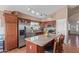 Kitchen area with stainless steel appliances and bar stool seating at 2640 S Terripin Cir, Mesa, AZ 85209