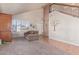 Light and airy living room with hardwood floors, neutral paint, and a staircase at 2640 S Terripin Cir, Mesa, AZ 85209