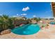 Backyard with a sparkling pool, mature landscaping, and ample space for outdoor entertaining at 2640 S Terripin Cir, Mesa, AZ 85209