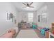 Bright playroom with lots of natural light and plenty of space for children to play at 265 W Rainbow Bridge Ln, San Tan Valley, AZ 85140