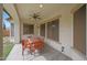 Covered patio with ceiling fan and dining table at 27255 N 81St Ln, Peoria, AZ 85383