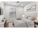 A serene bedroom showcasing contemporary design, a plush bed, and a sunlit window with blinds at 280 S Evergreen Rd # 1336, Tempe, AZ 85288