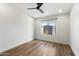 Inviting bedroom with hardwood floors, natural light, and a contemporary ceiling fan at 280 S Evergreen Rd # 1336, Tempe, AZ 85288