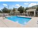 Community pool with comfortable lounging areas and a shaded pergola for relaxing poolside at 280 S Evergreen Rd # 1336, Tempe, AZ 85288