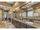 Bathroom features double sinks with granite counters and a large framed mirror at 2876 E Cherrywood Pl, Chandler, AZ 85249