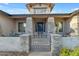 Close up of a front entrance featuring stone pillars and gated entry way at 2876 E Cherrywood Pl, Chandler, AZ 85249