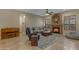 Cozy living room featuring a stone fireplace and neutral decor at 2876 E Cherrywood Pl, Chandler, AZ 85249