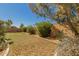 The backyard is fully fenced and features drought-tolerant landscaping at 29900 N Maravilla Dr, San Tan Valley, AZ 85143