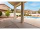 Backyard featuring a pool and desert landscaping at 3110 E Desert Flower Ln, Phoenix, AZ 85048