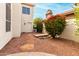 Charming backyard area with stepping stones and flowering shrubbery at 3110 E Desert Flower Ln, Phoenix, AZ 85048