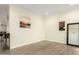 Open-concept living room with wood-look flooring at 3126 W Apollo Rd, Phoenix, AZ 85041