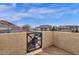 Balcony showing community and architectural details with metal privacy gate for security at 3236 E Chandler Blvd # 2057, Phoenix, AZ 85048