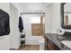 Well-lit bathroom featuring a shower-tub combo with decorative tile detail at 3236 E Chandler Blvd # 2057, Phoenix, AZ 85048