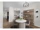 Dining room featuring modern decor, open layout, and elegant chandelier at 3236 E Chandler Blvd # 2057, Phoenix, AZ 85048