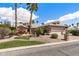 Charming single-story home featuring a two-car garage and meticulously landscaped front yard at 3801 N 154Th Ln, Goodyear, AZ 85395