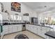 Bright and airy kitchen with stainless steel appliances, plenty of storage, natural light and a modern feel at 3801 N 154Th Ln, Goodyear, AZ 85395