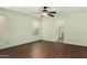 Bedroom featuring ceiling fan, natural light, and wood floors at 4622 E Fairbrook Cir, Mesa, AZ 85205