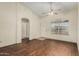 Bright living room with hard wood flooring, ceiling fan and natural light at 4622 E Fairbrook Cir, Mesa, AZ 85205