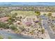 Expansive aerial view showcasing a park, play areas, and residential neighborhood against a mountain backdrop at 4728 E Swilling Rd, Phoenix, AZ 85050