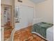 Cozy bedroom features Saltillo tile flooring, mirrored closet, and a serene, well-lit atmosphere at 4728 E Swilling Rd, Phoenix, AZ 85050