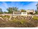 Desert Ridge community sign with manicured landscaping and an attractive building in the background at 4728 E Swilling Rd, Phoenix, AZ 85050