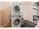 Efficient laundry room with stacked LG washer and dryer, offering convenience and functionality at 4728 E Swilling Rd, Phoenix, AZ 85050