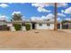 Charming single-story home featuring a low-maintenance landscape and attached garage at 5716 W Hazelwood St, Phoenix, AZ 85031