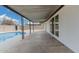 Covered patio with view of sparkling pool and block wall fencing at 5716 W Hazelwood St, Phoenix, AZ 85031