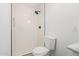 This bathroom features a tiled shower with black fixtures and a white toilet at 5716 W Hazelwood St, Phoenix, AZ 85031