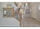 View of the two story entryway with staircase and tile flooring at 6221 S 45Th Gln, Laveen, AZ 85339