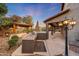 Outdoor kitchen boasts a built-in grill, sink, and an adjacent gazebo and spa for ultimate entertaining and relaxation at 6221 S 45Th Gln, Laveen, AZ 85339