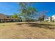 Expansive community lawn with mature trees surrounding residential buildings at 6837 E Osborn Rd # F, Scottsdale, AZ 85251