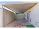 A covered patio with ample space and durable tile flooring at 6837 E Osborn Rd # F, Scottsdale, AZ 85251