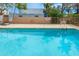 Refreshing community pool offering shaded seating and a shallow area for relaxation at 6920 E 4Th St # 209, Scottsdale, AZ 85251