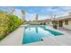 Stunning pool surrounded by lush landscaping, creating a serene oasis at 7125 N 2Nd Pl, Phoenix, AZ 85020